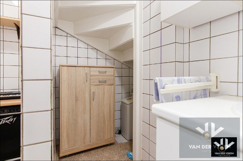 Charmante en verzorgde rijwoning met gezellig stadstuintje en 2 parkeerplaatsen in hartje Runkst foto 15