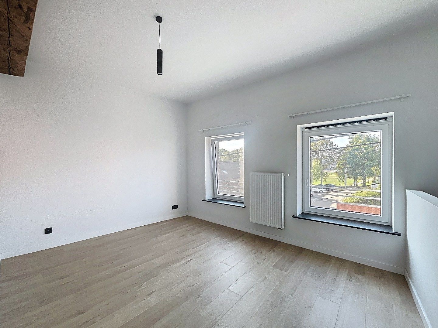 Ruim gerenoveerd appartement in hartje Hoegaarden foto 6