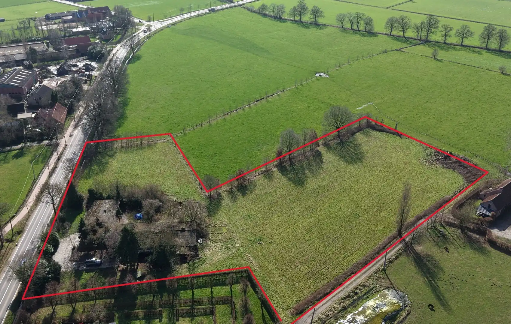 Unieke eigendom op 13.183 m² met te renoveren woning en vergunde stallingen foto 29