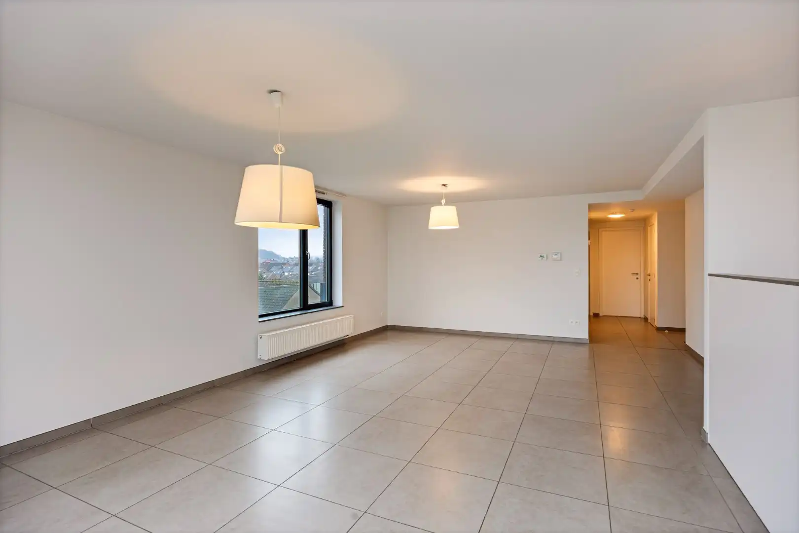 Ruim en lichtrijk appartement met 2 slaapkamers, terras en autostaanplaats vlakbij autostrade - EPC 108 kWh/m² foto 5