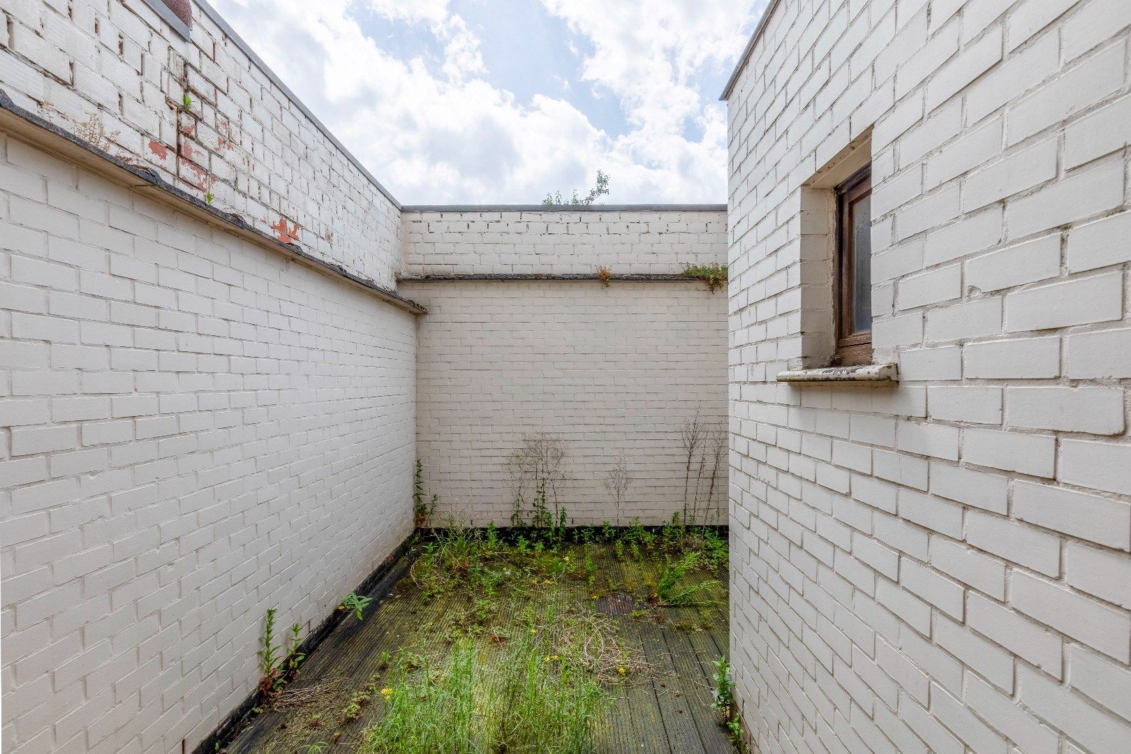 Te renoveren woning met stadstuin centraal gelegen in Sint-Amandsberg foto 17