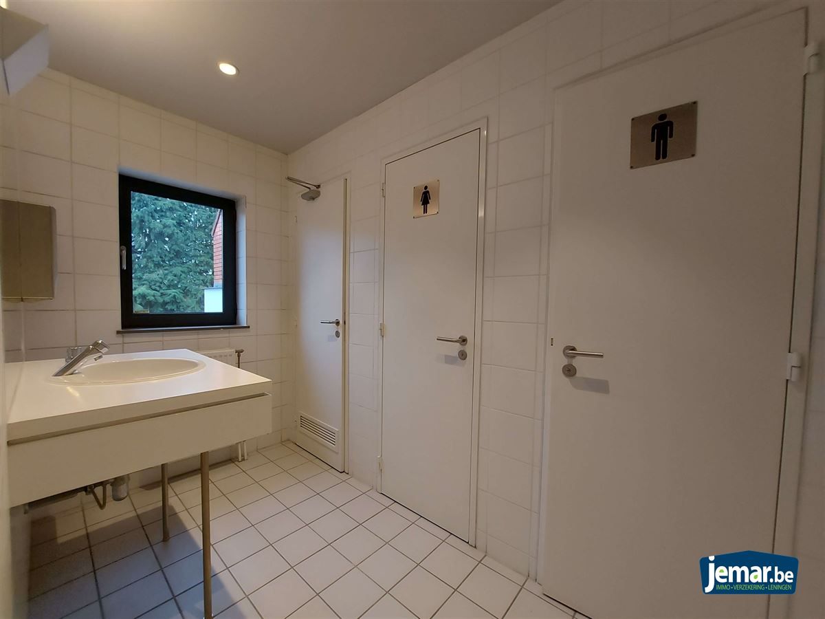 AANDELENOVERDRACHT: Handelspand met appartement foto 23