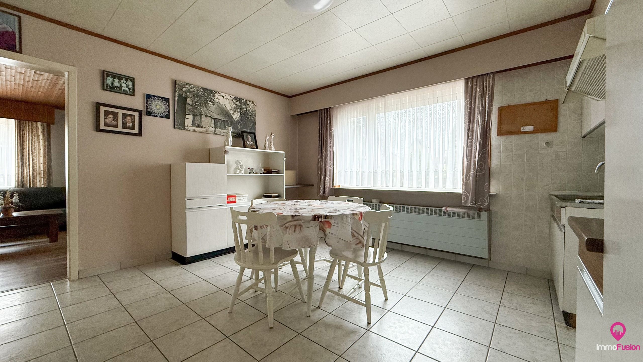 Te vernieuwen woning met 4 slaapkamers en zonnige tuin! foto 9