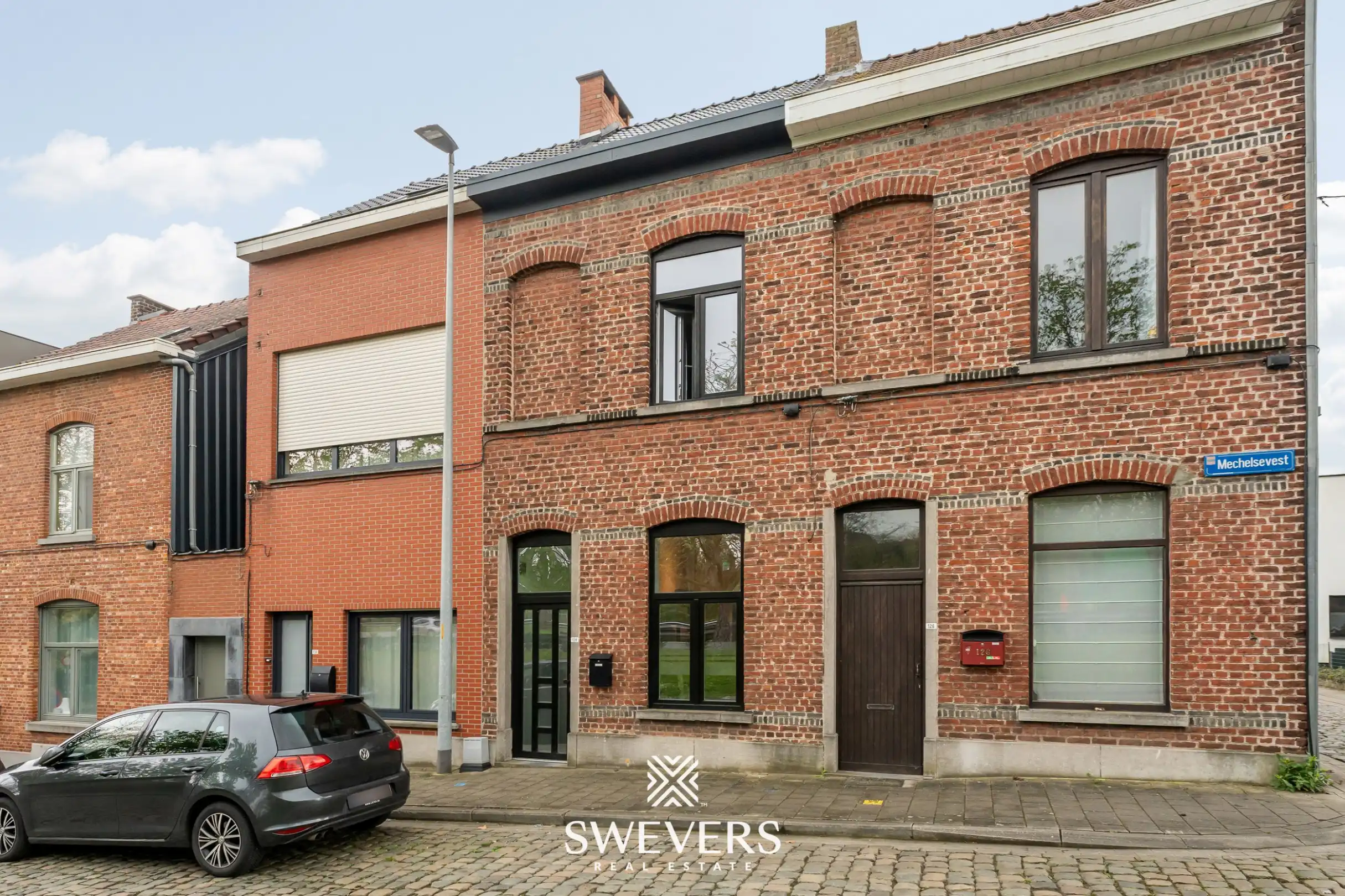 Instapklare stadswoning met zonnige tuin op toplocatie nabij centrum Leuven foto 22