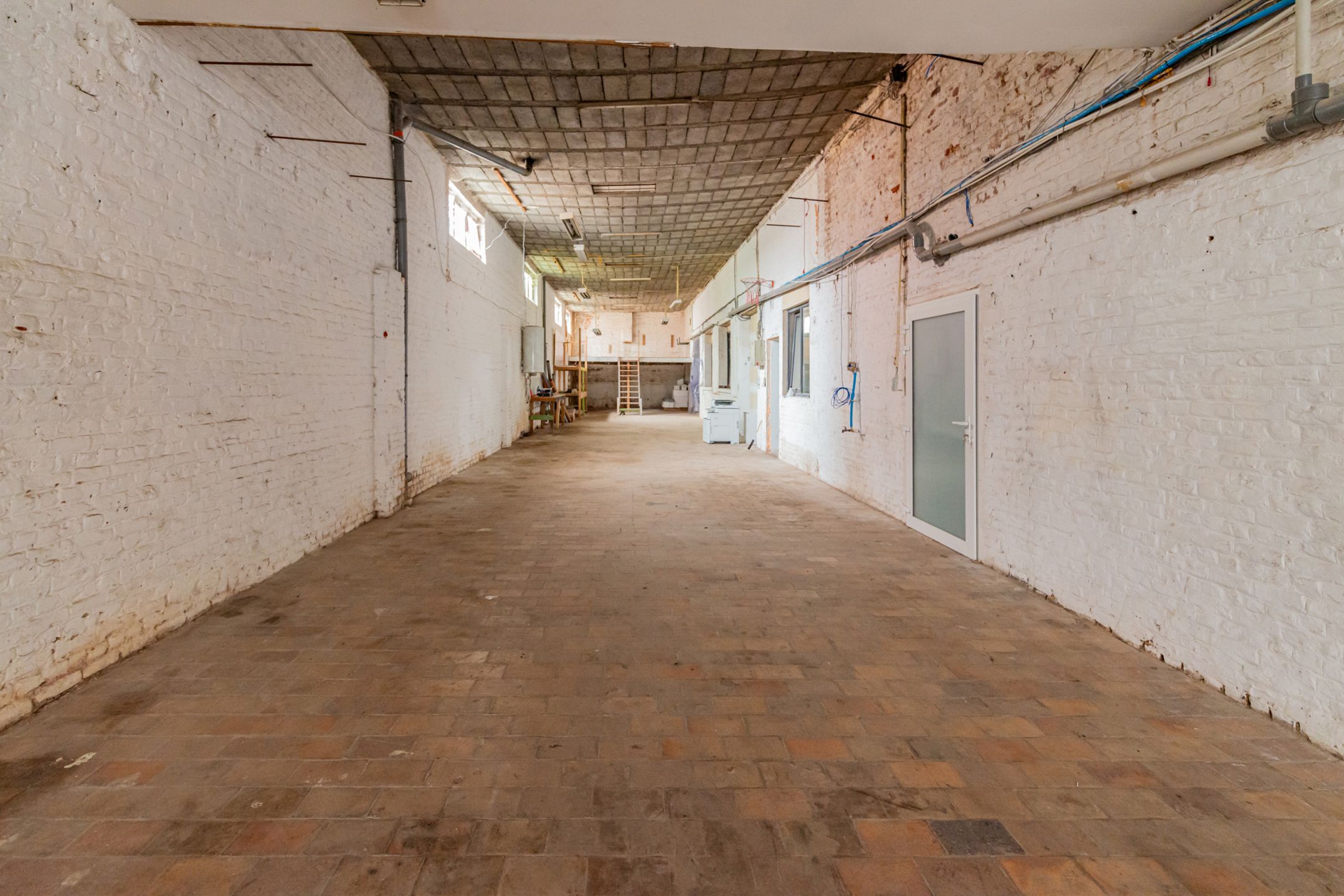 Gebouw met 3 appartementen en opslag te koop foto 26