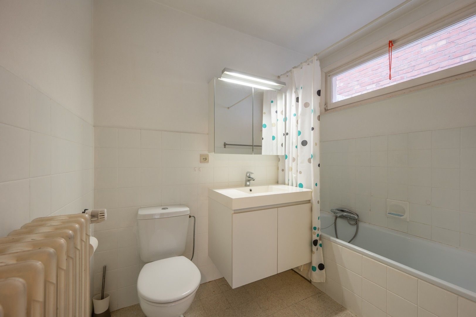 Verzorgd appartement gelegen aan de mark in Heist foto 12