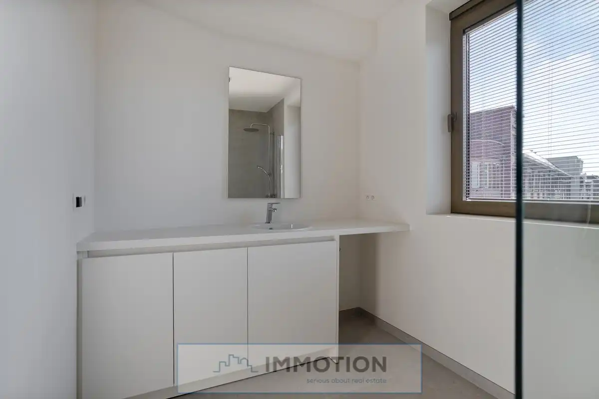 Nieuwbouw duplex appartement met terras foto 11