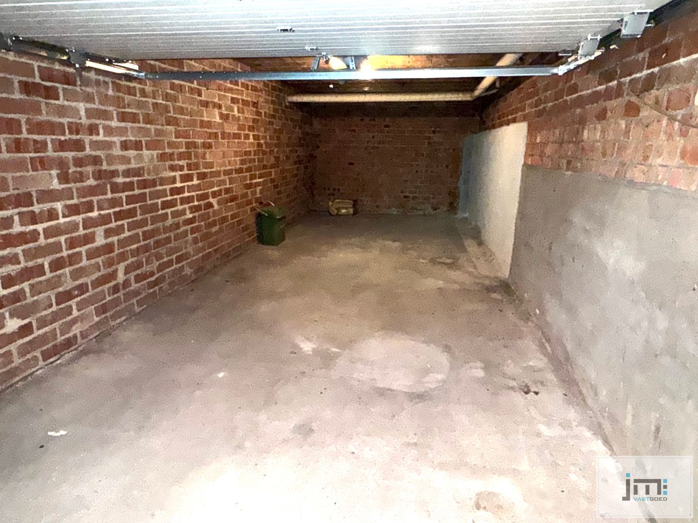 Gelijkvloers appartement met garage foto 11
