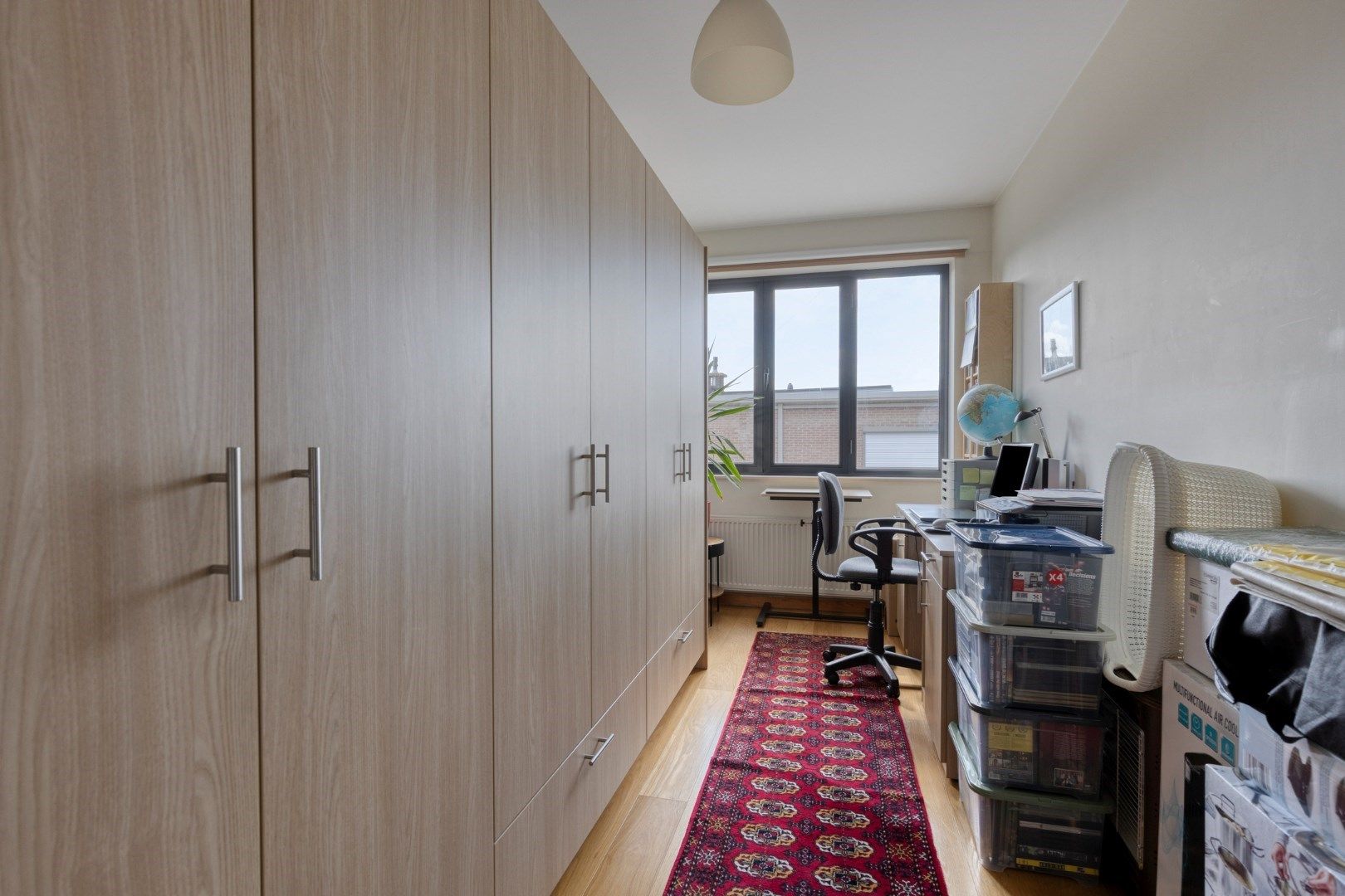 Instapklaar 2-slaapkamer appartement met zonnig terras en optionele garagebox foto 11