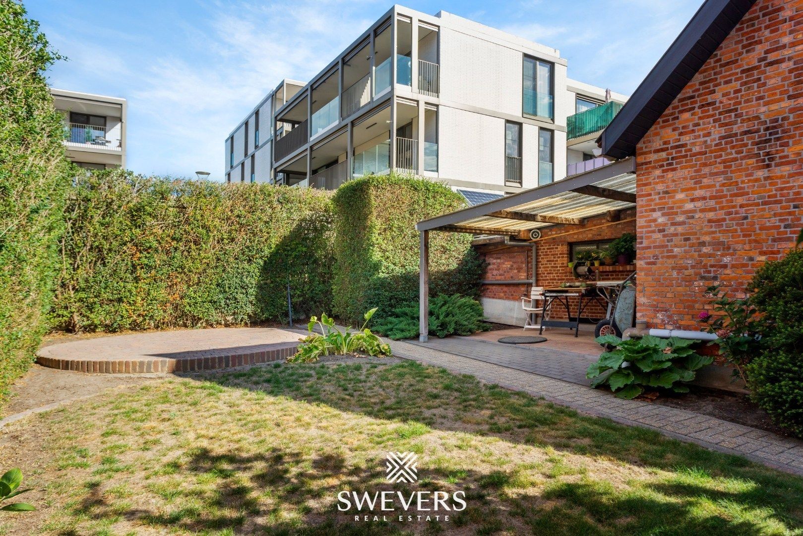 Ruim duplexappartement met grote veranda, riant terras, tuin en garage in hartje Lummen foto 23