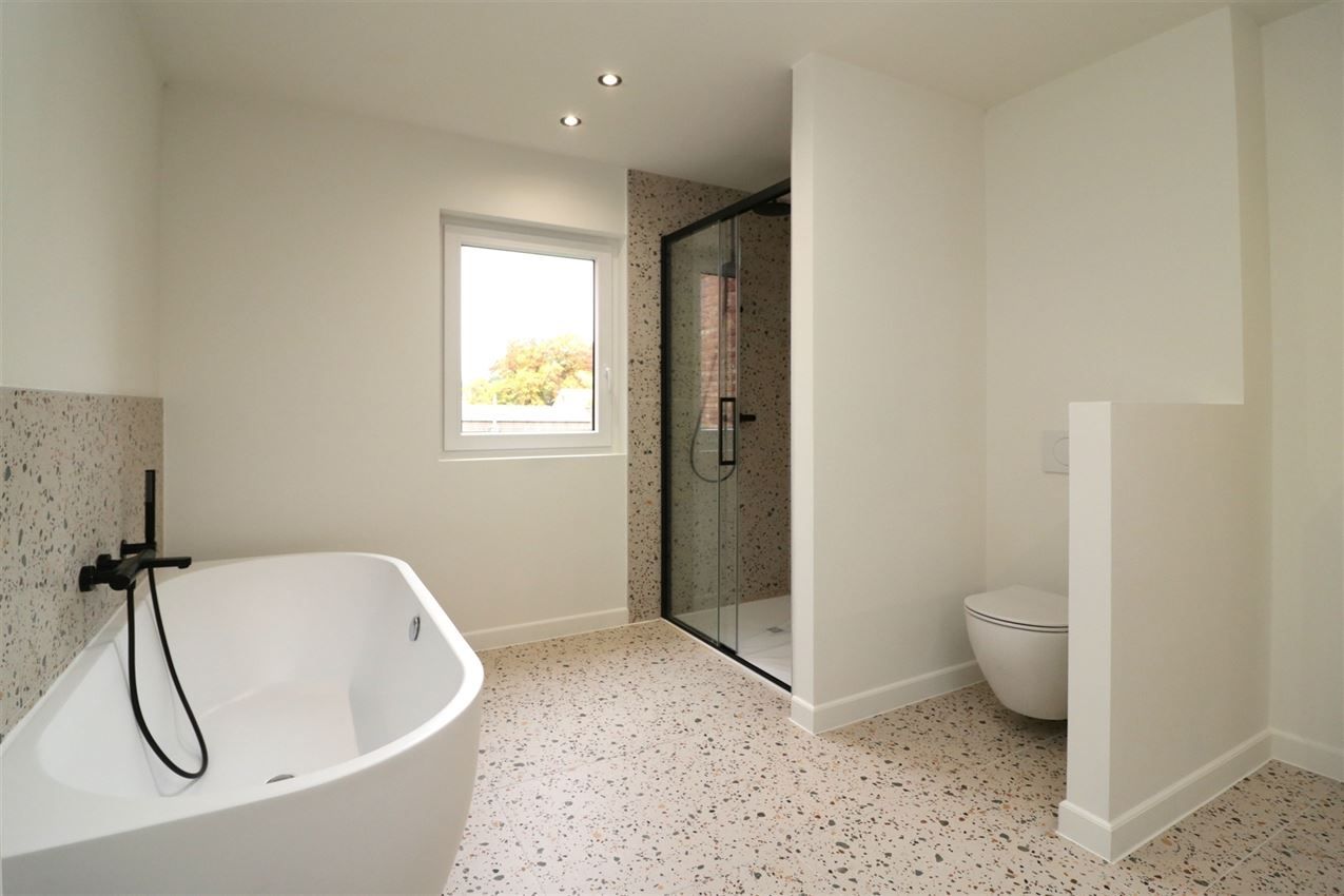 Hoogwaardig gerenoveerde stadswoning met 3slk en tuintje foto 19