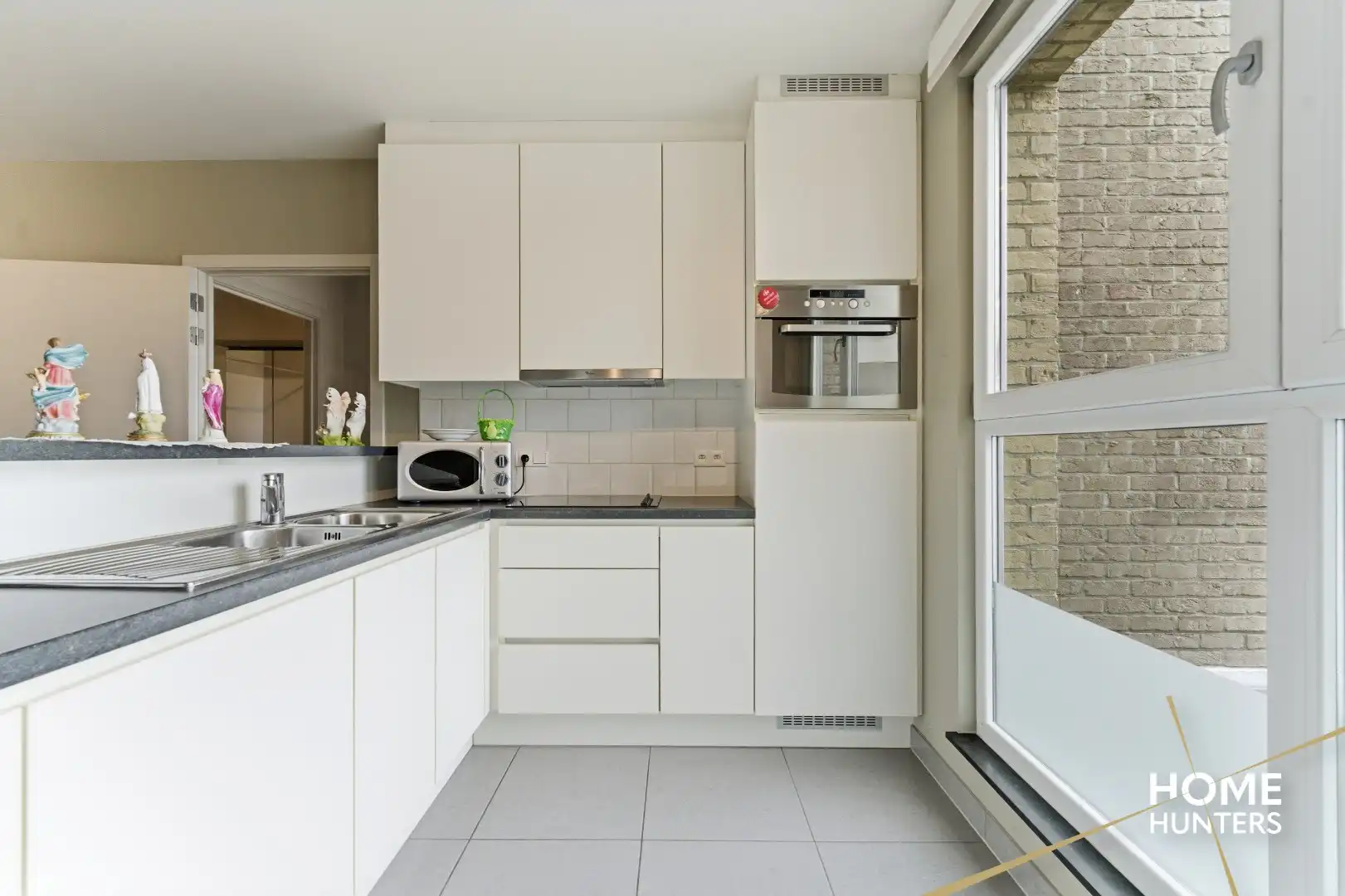 Gezellig appartement met 2 slaapkamers en terras op markt van Houthulst! foto 7