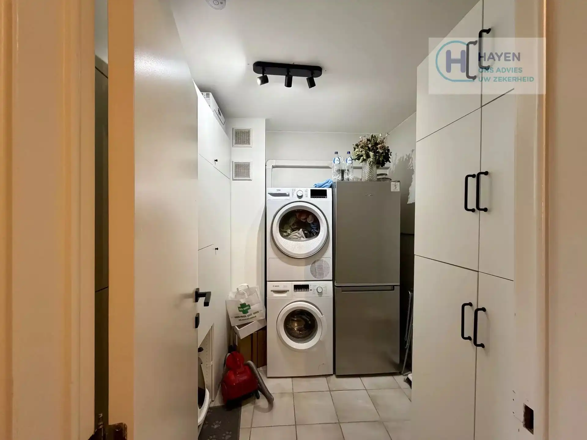 Instapklaar appartement met 2 slaapkamers en bovengrondse garage in hartje Kermt foto 15