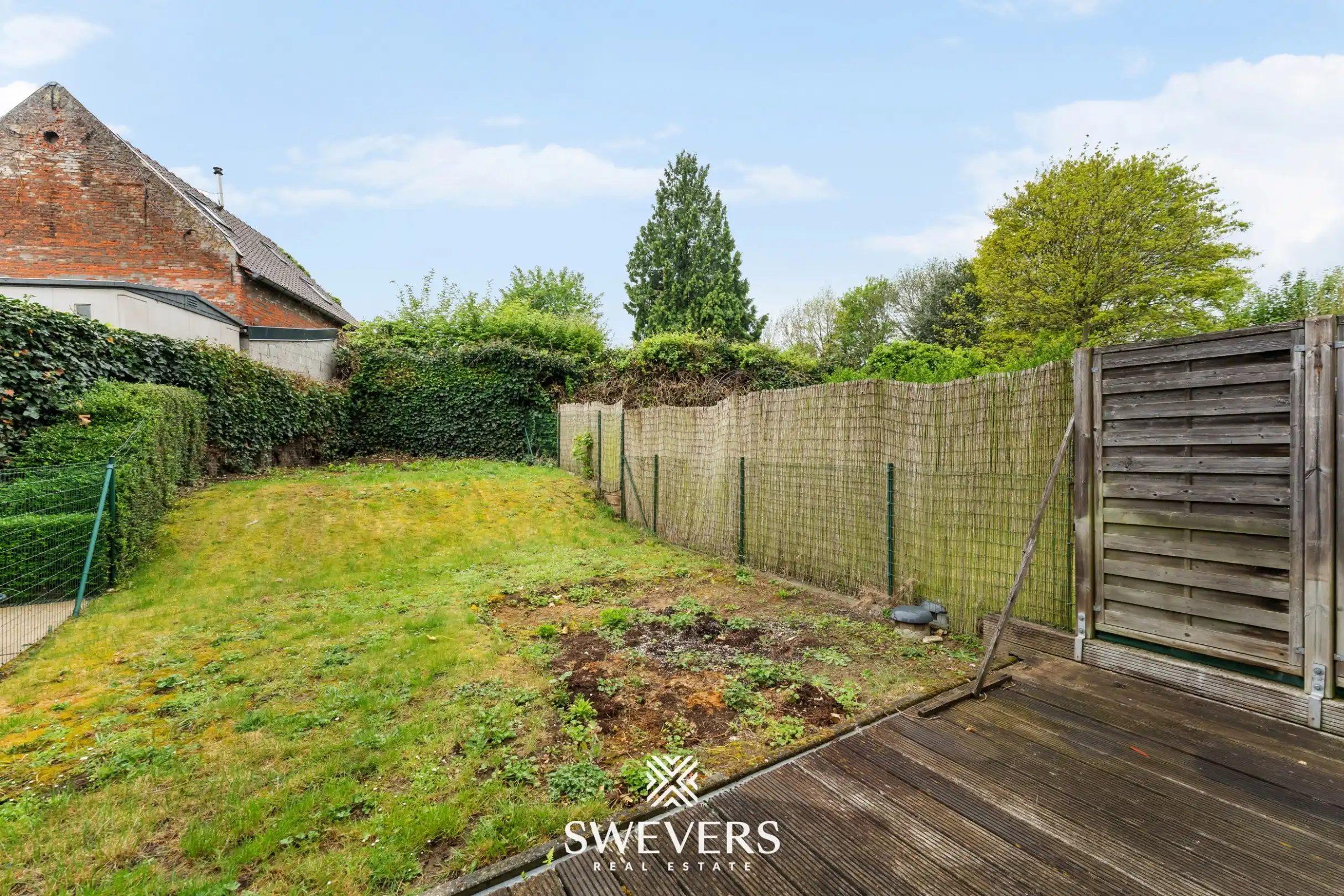 Ruim duplex appartement met 2 slaapkamers en tuin foto 18