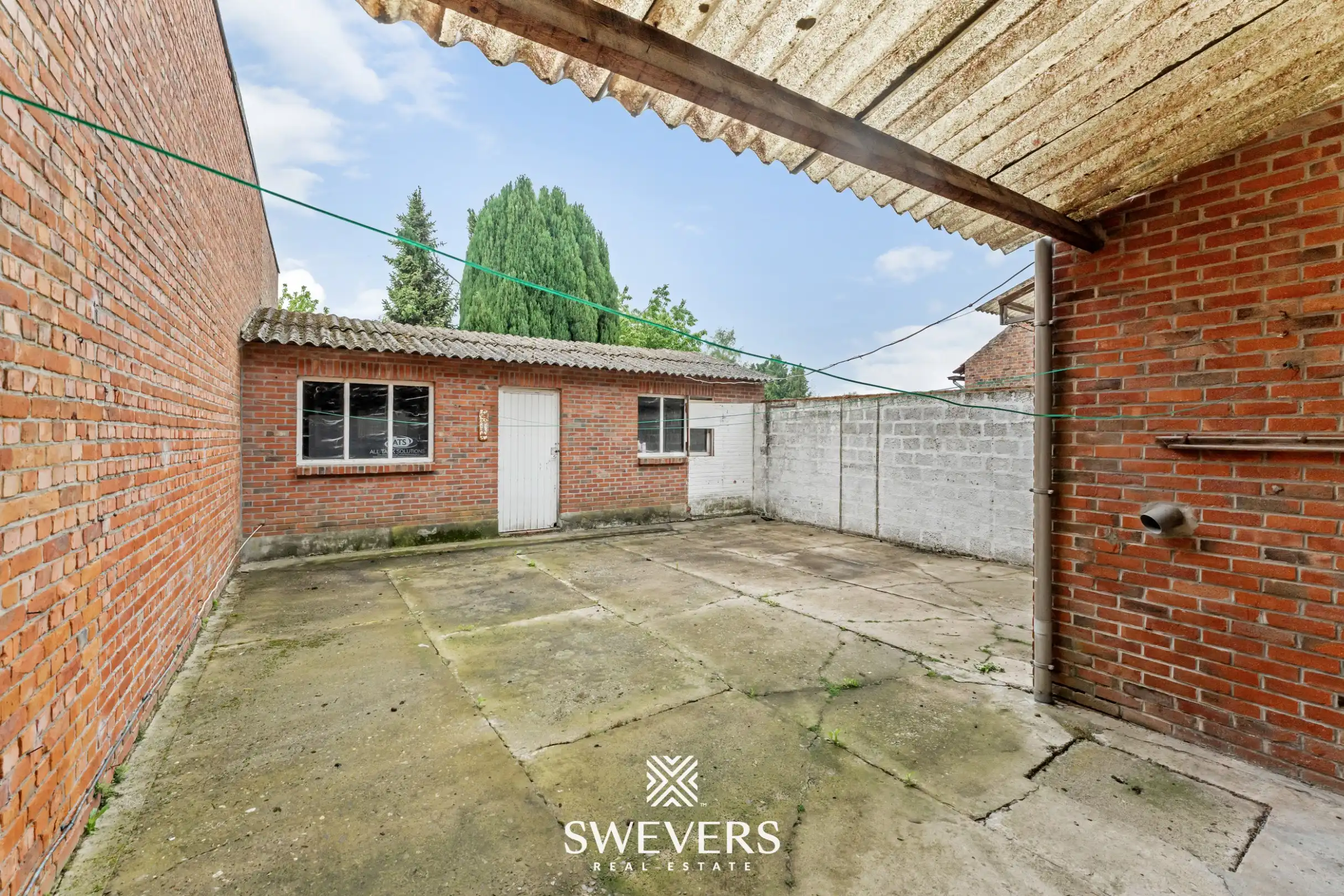 Statige woning met veel potentieel te Hoepertingen foto 24