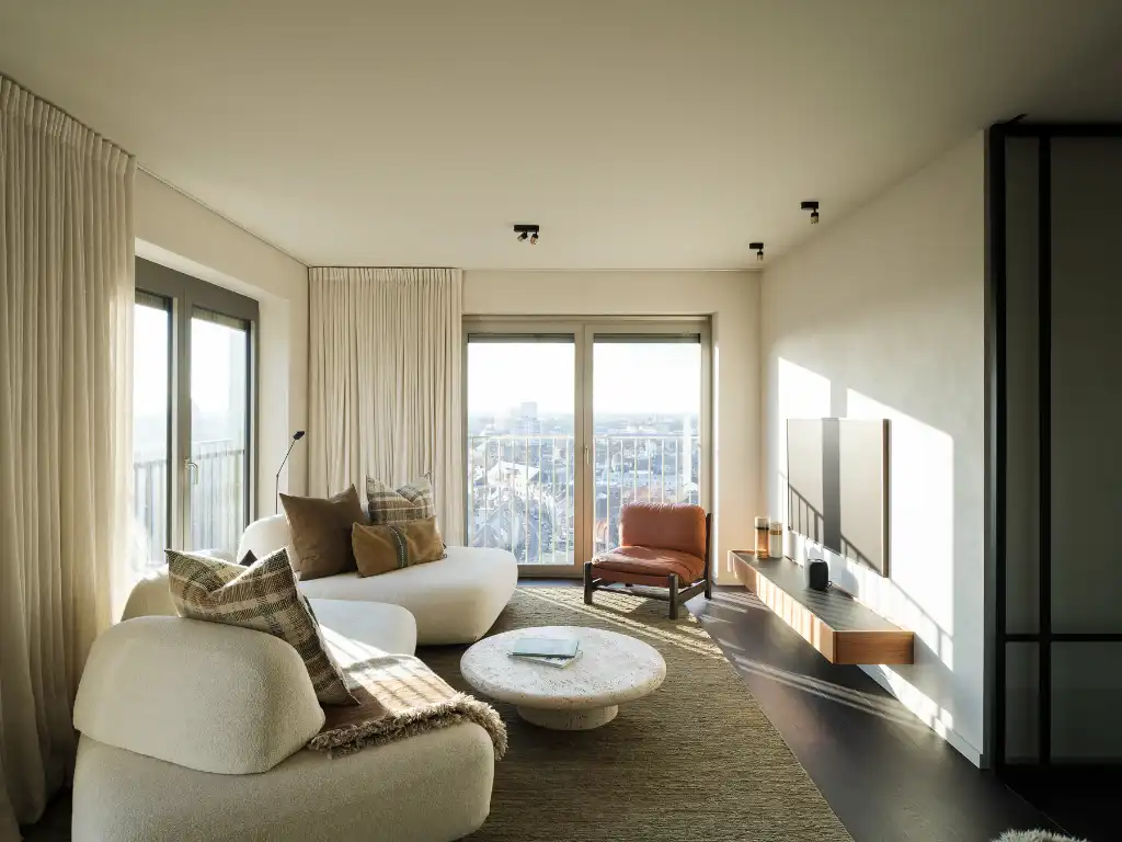 Luxe penthouse (bj. 2021) met twee kamers en een uitzonderlijk terras met panoramisch zicht over Gent en zijn torens. foto {{pictureIndex}}