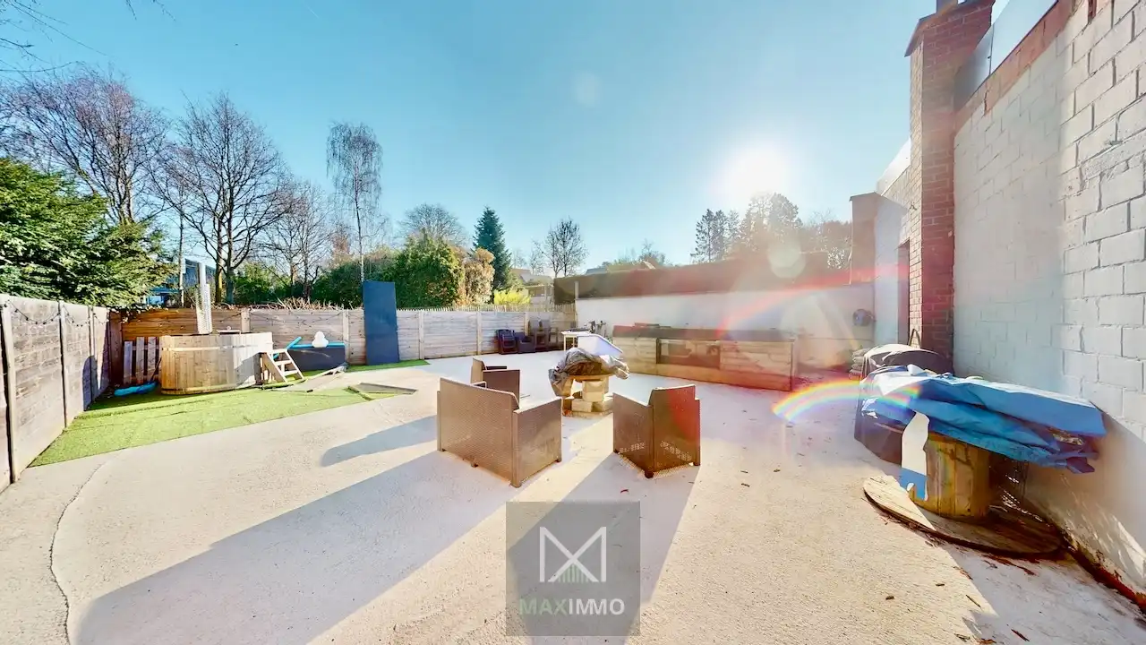 Gelijkvloerse bungalow met loods van 180 m² in het centrum van Marke foto 21