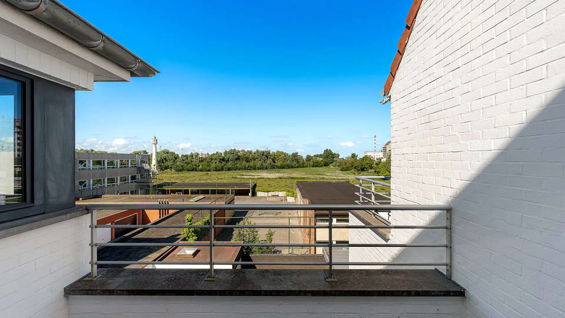 Zonnig duplex-appartement met grote zonneterrassen te Heist foto 12