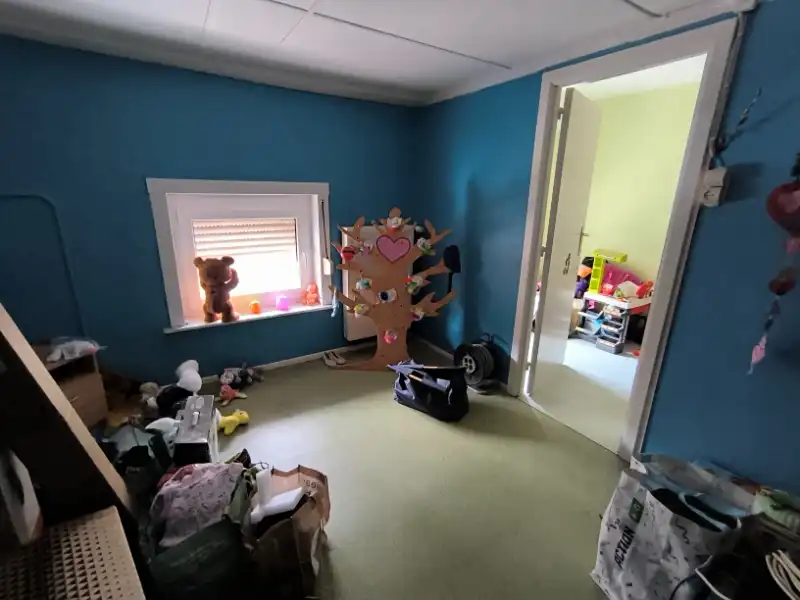 Rijwoning met garage en tuin foto 9