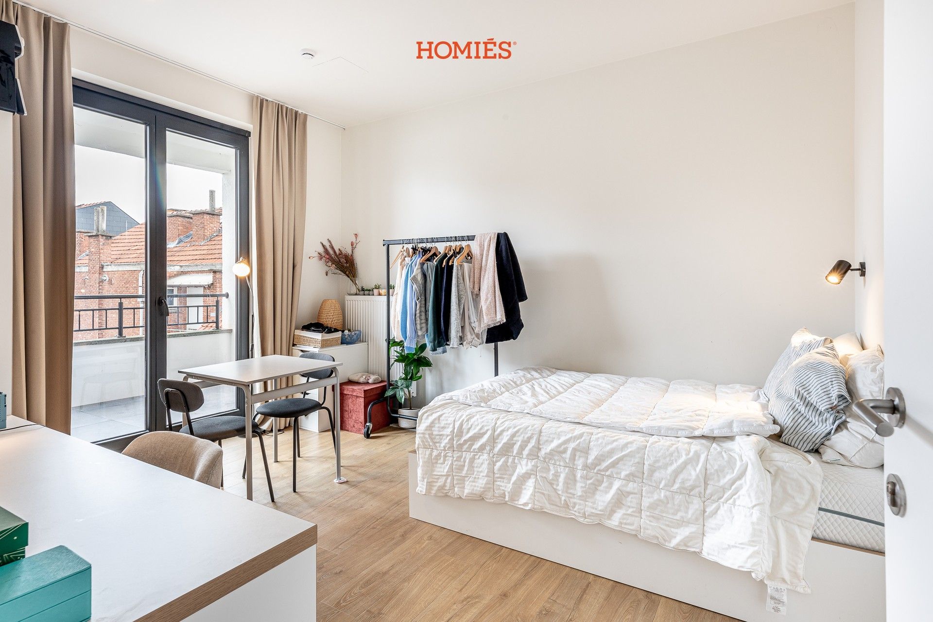 Studentenkamer met terras en eigen sanitair foto {{pictureIndex}}