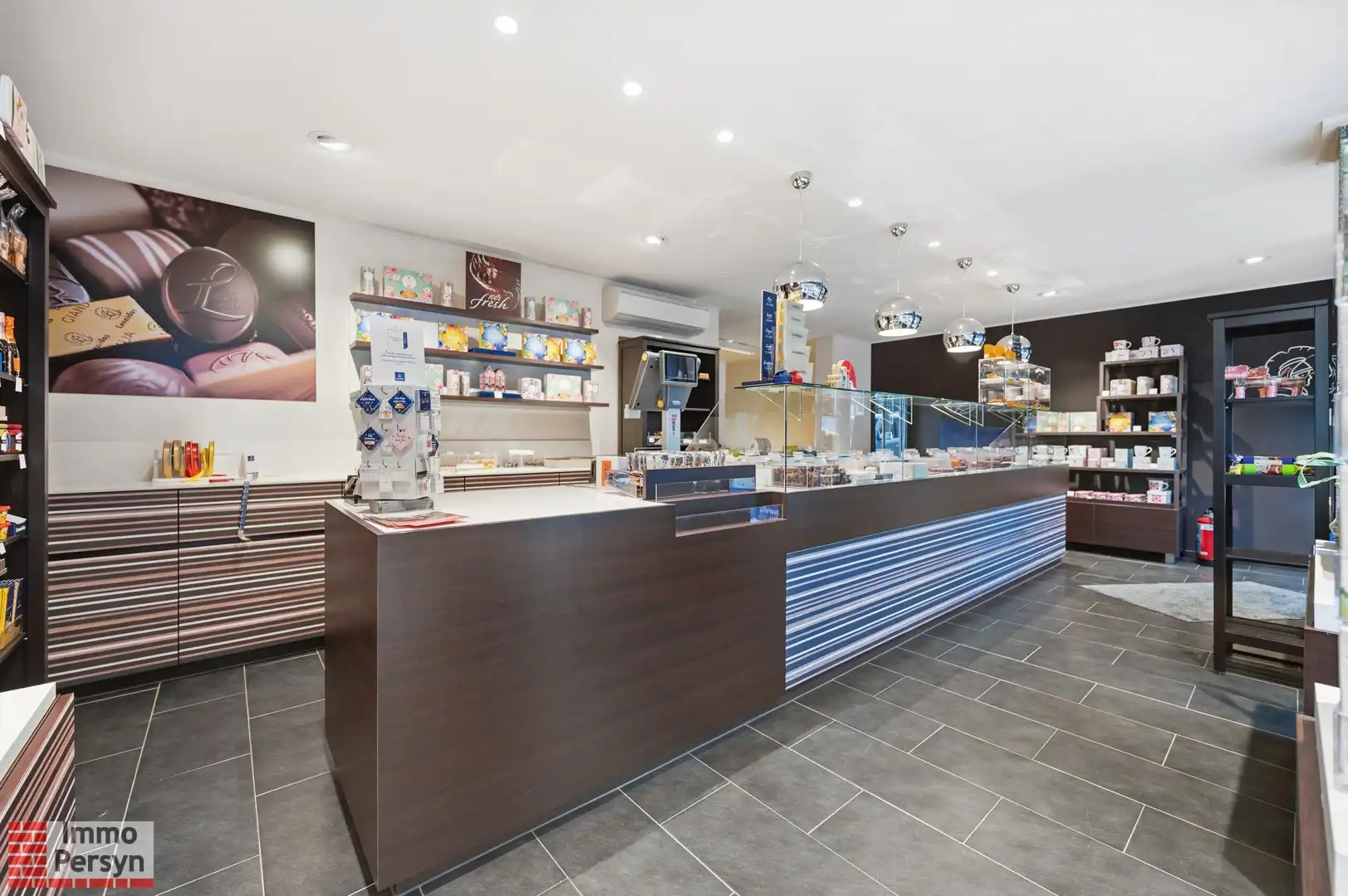 Zorgeloze investering op toplocatie: Gerenoveerd handelspand (Leonidas) in hartje Scherpenheuvel foto 4