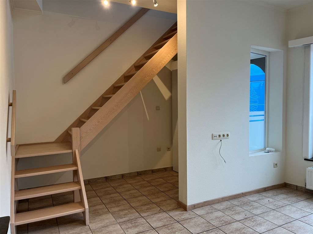 Gezellig en instapklaar triplex appartement met 2 slaapkamers in het centrum van Opoeteren foto 2