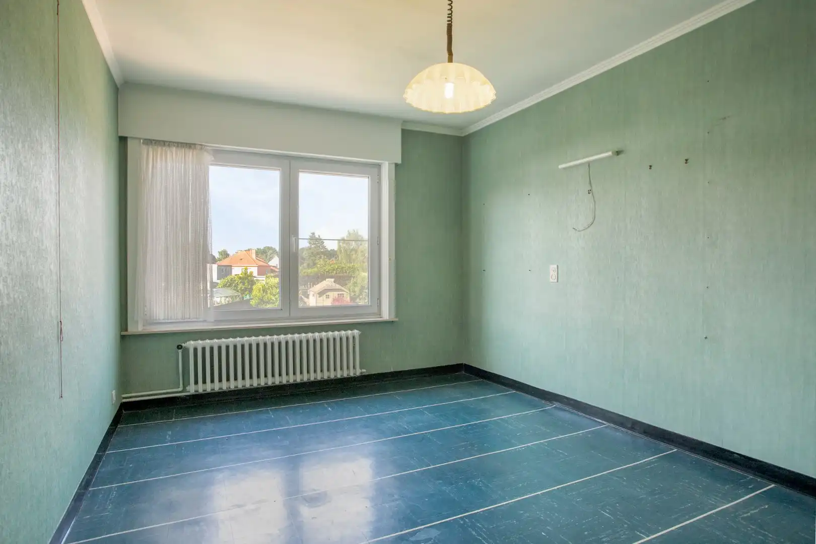 Gezellige rijwoning met 3 slaapkamers en garage! foto 9