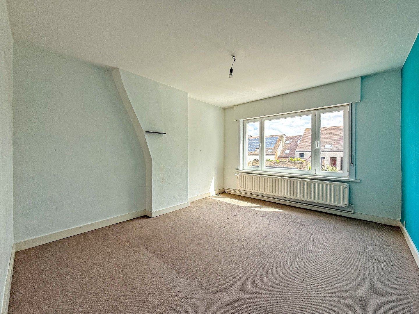 Instapklare rijwoning met garage en zonnige tuin nabij marktplein (157 m²) foto 8