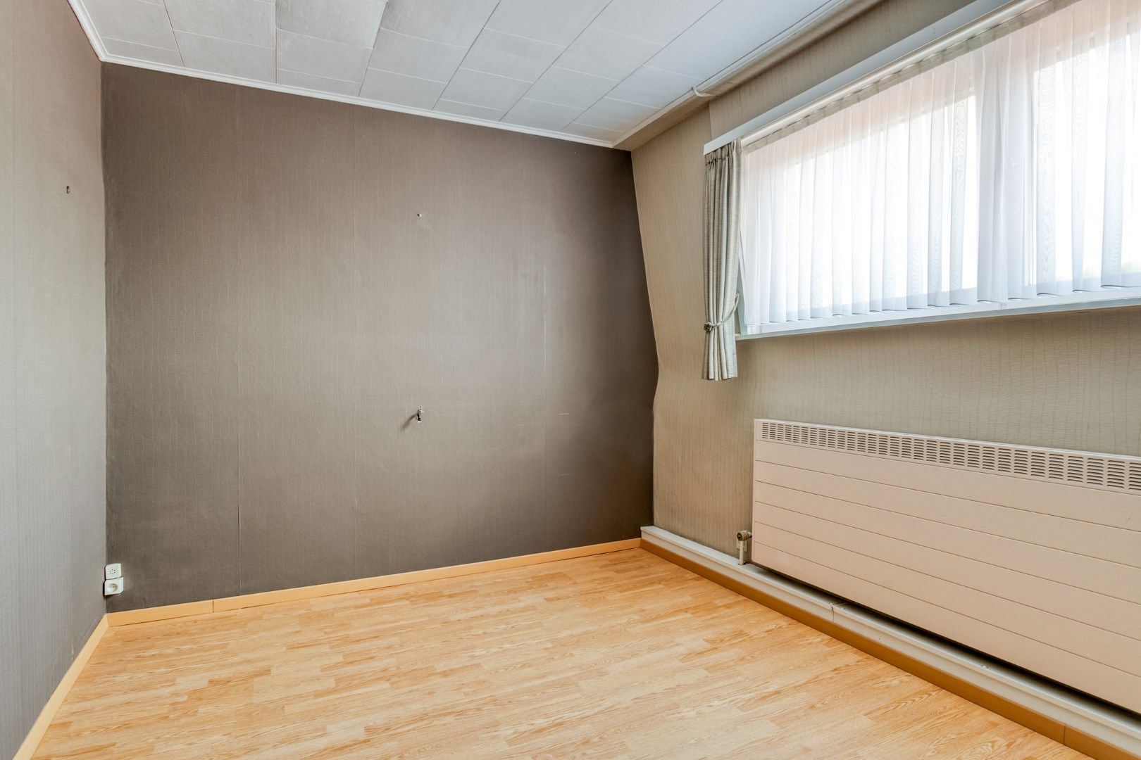 Verzorgde woning met 2 slaapkamers, prachtige tuin én garage! foto 11