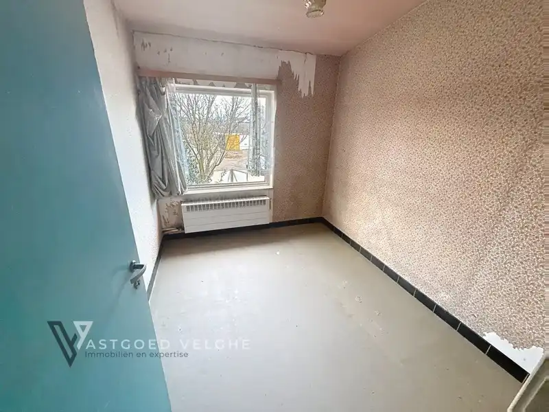 Te renoveren halfopen bebouwing met garage te koop in Maasmechelen (Boudewijnlaan) foto 12