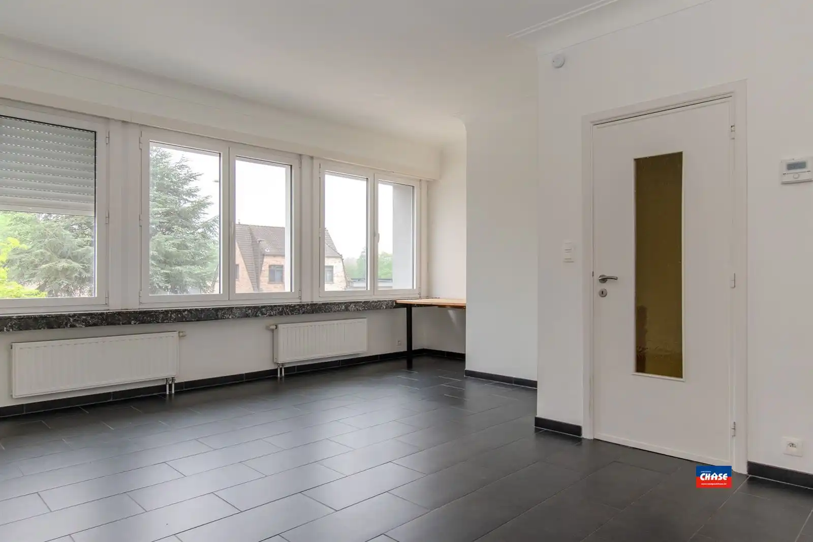 Bel-étage met 2 slaapkamers, garage en tuin foto 10