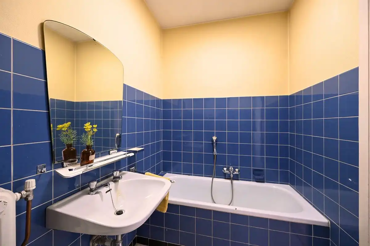 Lichtrijk te renoveren hoekappartement in hartje Brasschaat foto 18