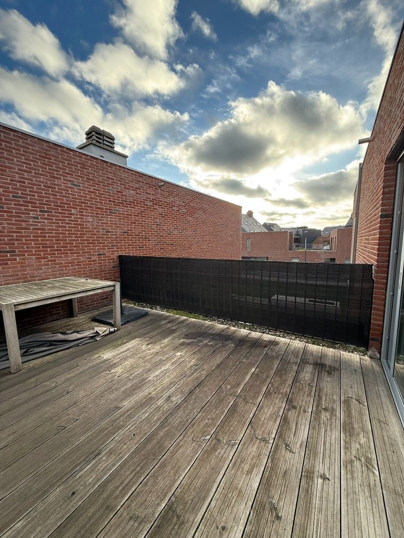 Instapklaar appartement met ruim terras vlakbij het centrum van Diepenbeek. foto 8