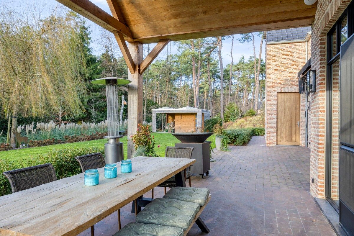 Ruim ingedeelde en kwalitatief afgewerkte villa op een mooi perceel met naastgelegen bouwgrond. foto 34