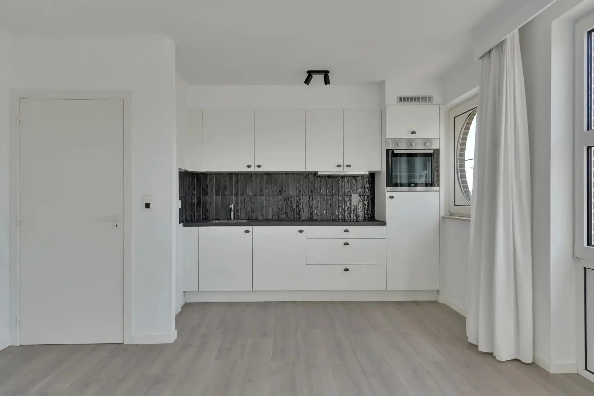 Energiezuinig appartement met terras, garage en 2 autostaanplaatsen foto 3