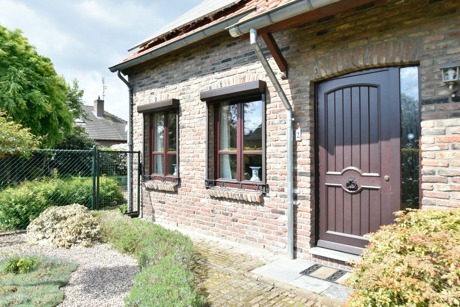 Ruim landelijk woonhuis met lichtrijke tuinkamer, inpandige garage en vier slaapkamers gelegen in het geliefde Neerharen foto 34