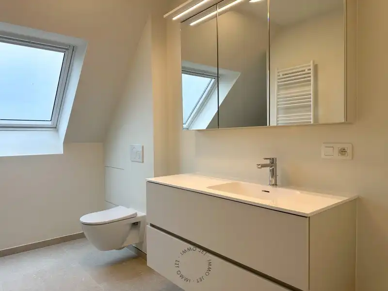 Prachtig gelegen nieuwbouw duplexappartement met drie slaapkamers, groot terras en autostaanplaats foto 15