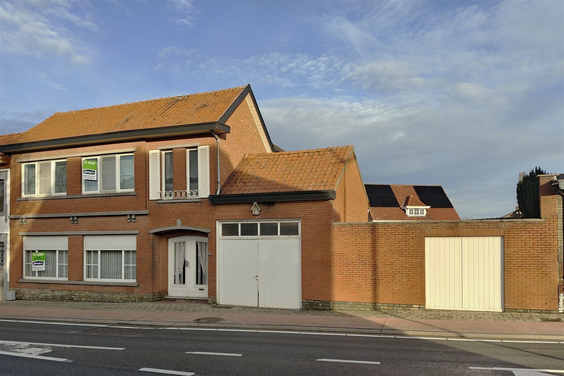 Goed onderhouden woning met 3 slpk. en 2 ingangen in Mopertingen foto 2