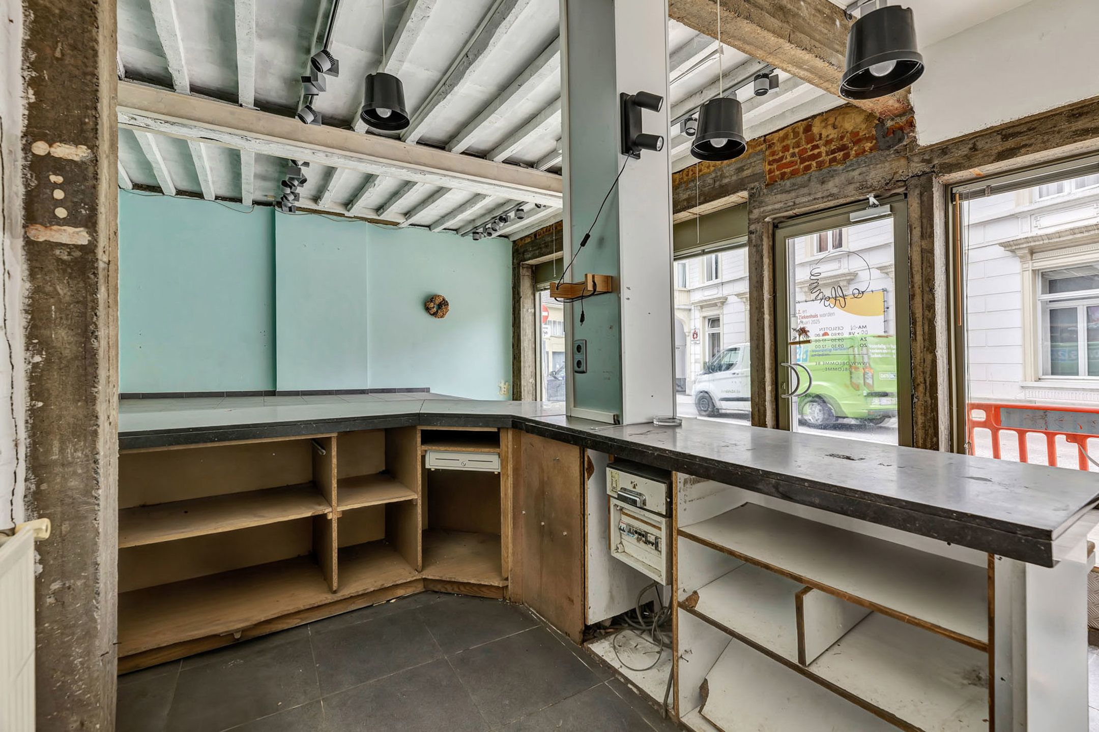 Opbrengsteigendom: Handelsruimte met 3 slpk app in centrum foto 12