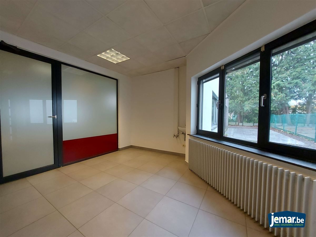 AANDELENOVERDRACHT: Handelspand met appartement foto 12