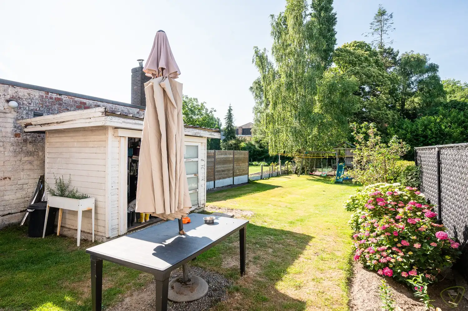 Te renoveren gezinswoning met grote tuin in het centrum van Bassevelde foto 17