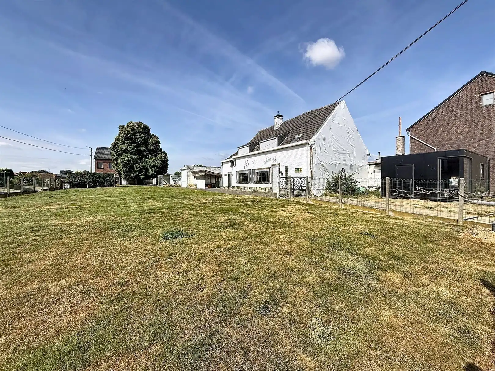 Te renoveren woning OF 2 bouwloten voor open bebouwing foto 8