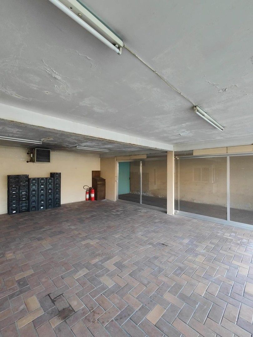 Woning met loods en voormalige showroom foto 21