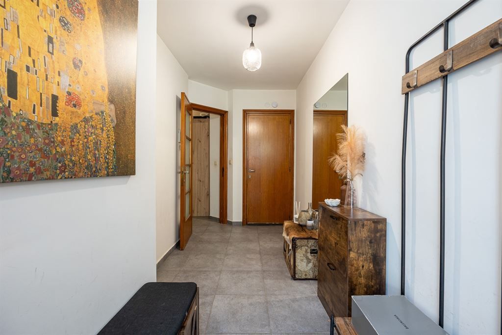 Gelijkvloers appartement met groene tuin foto 10