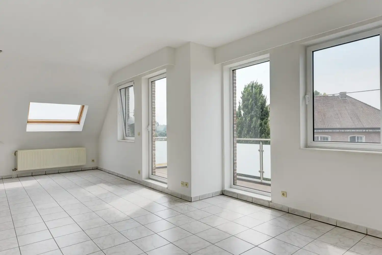 Ruim en energiezuinig Duplex-dakappartement met 4 slaapkamers, 2 badkamers en optionele garagestaanplaats foto 3