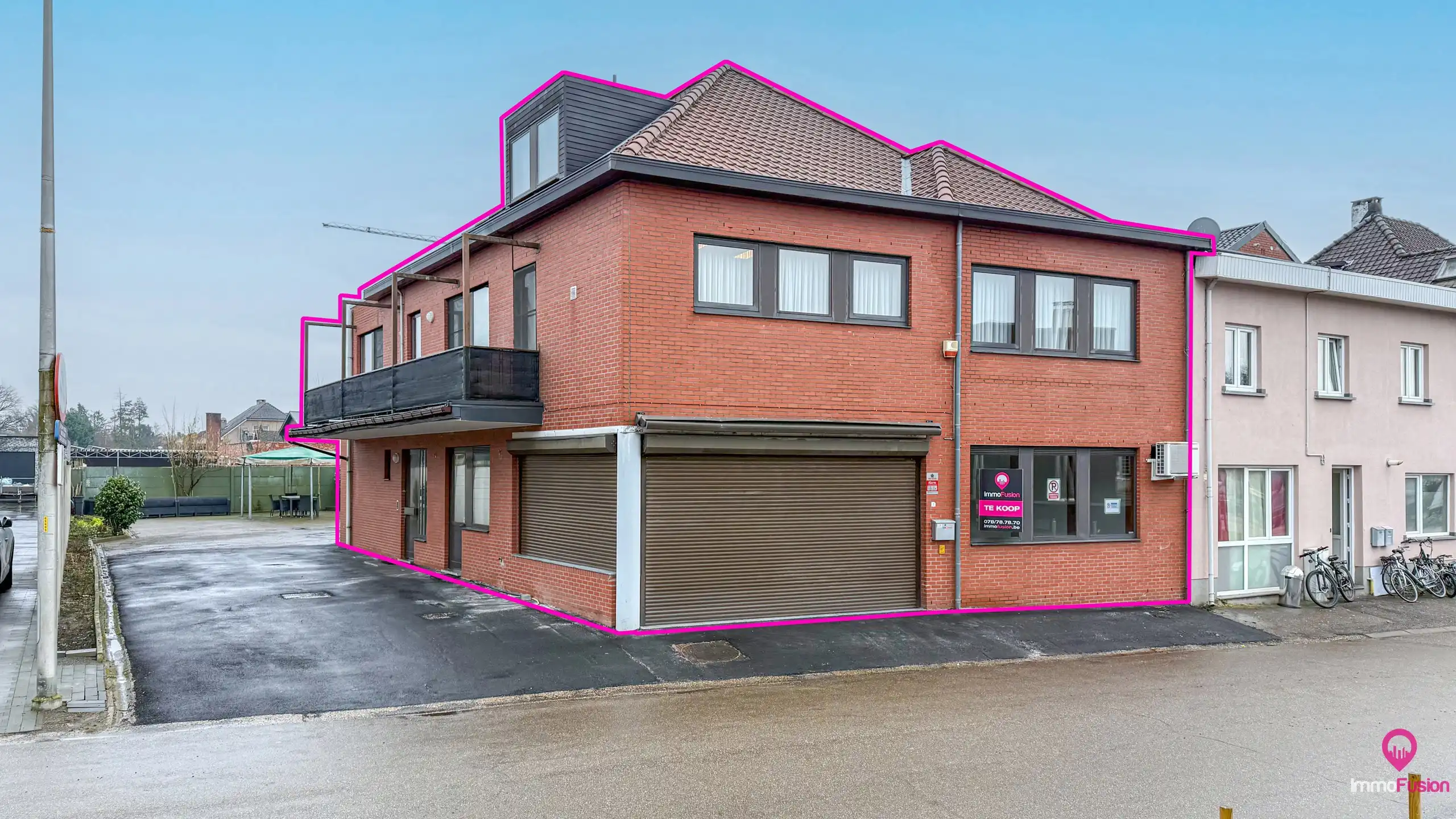 Handelspand met woonst op zeer goede commerciele ligging! foto 2