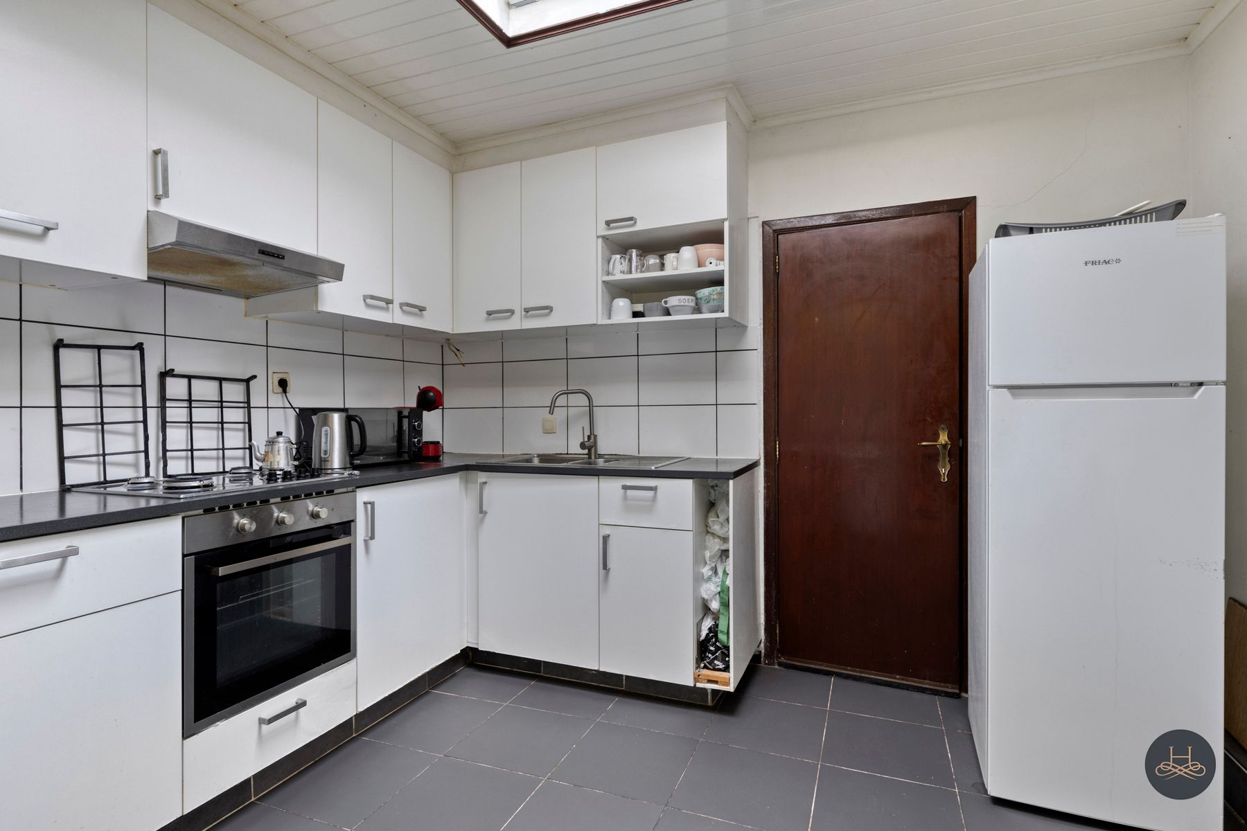 Gezellig centraal gelegen woning met potentieel foto 7