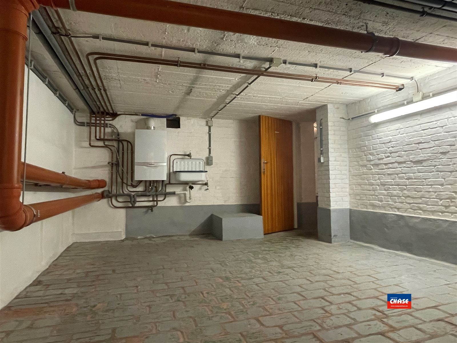 Gelijkvloersappartement met één slaapkamer, prachtige tuin en grote kelder foto 19
