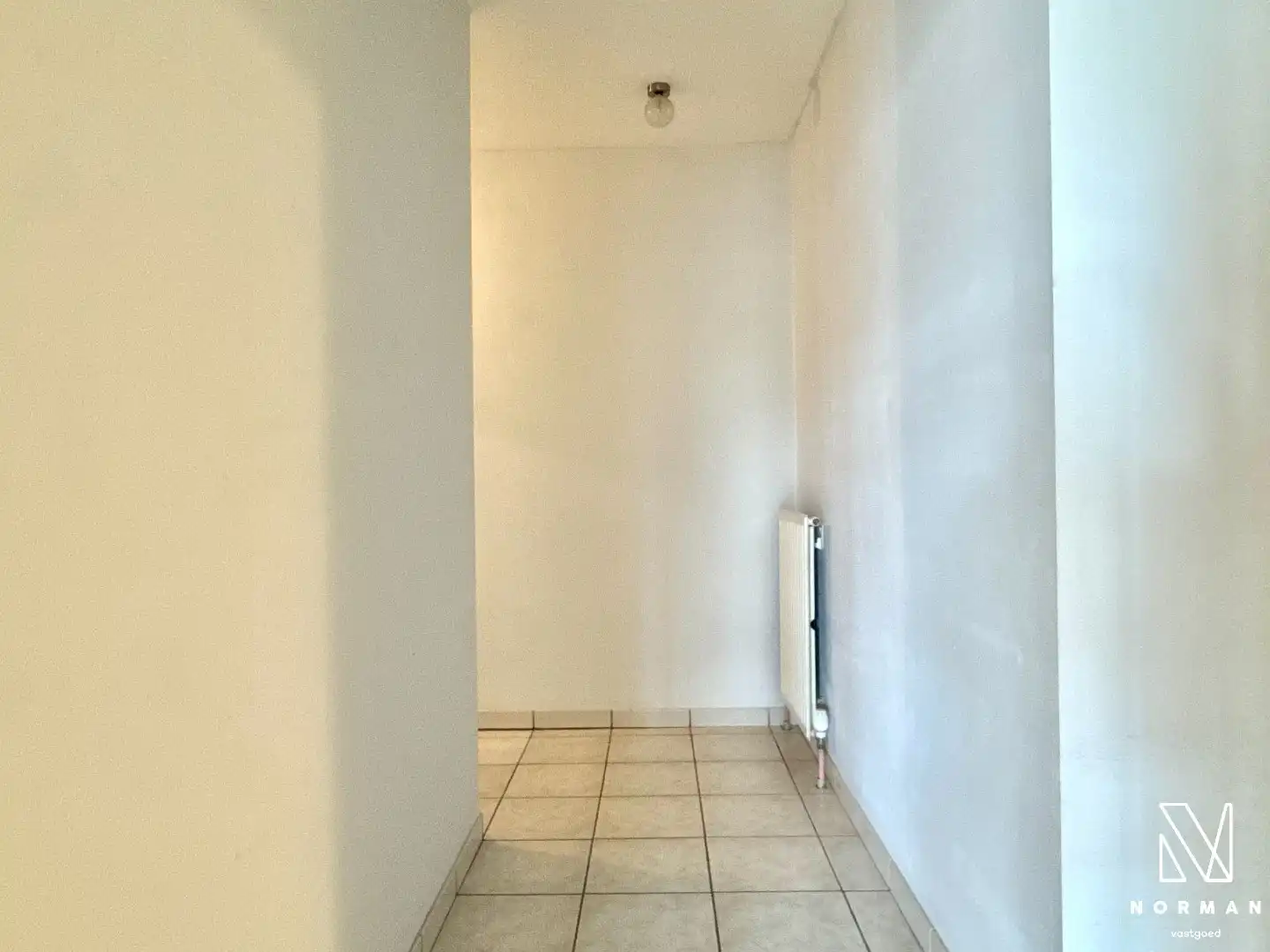 Lichtrijk en energiezuinig appartement met 2 slaapkamers, terras en garage te koop in centrum Kuurne! foto 12