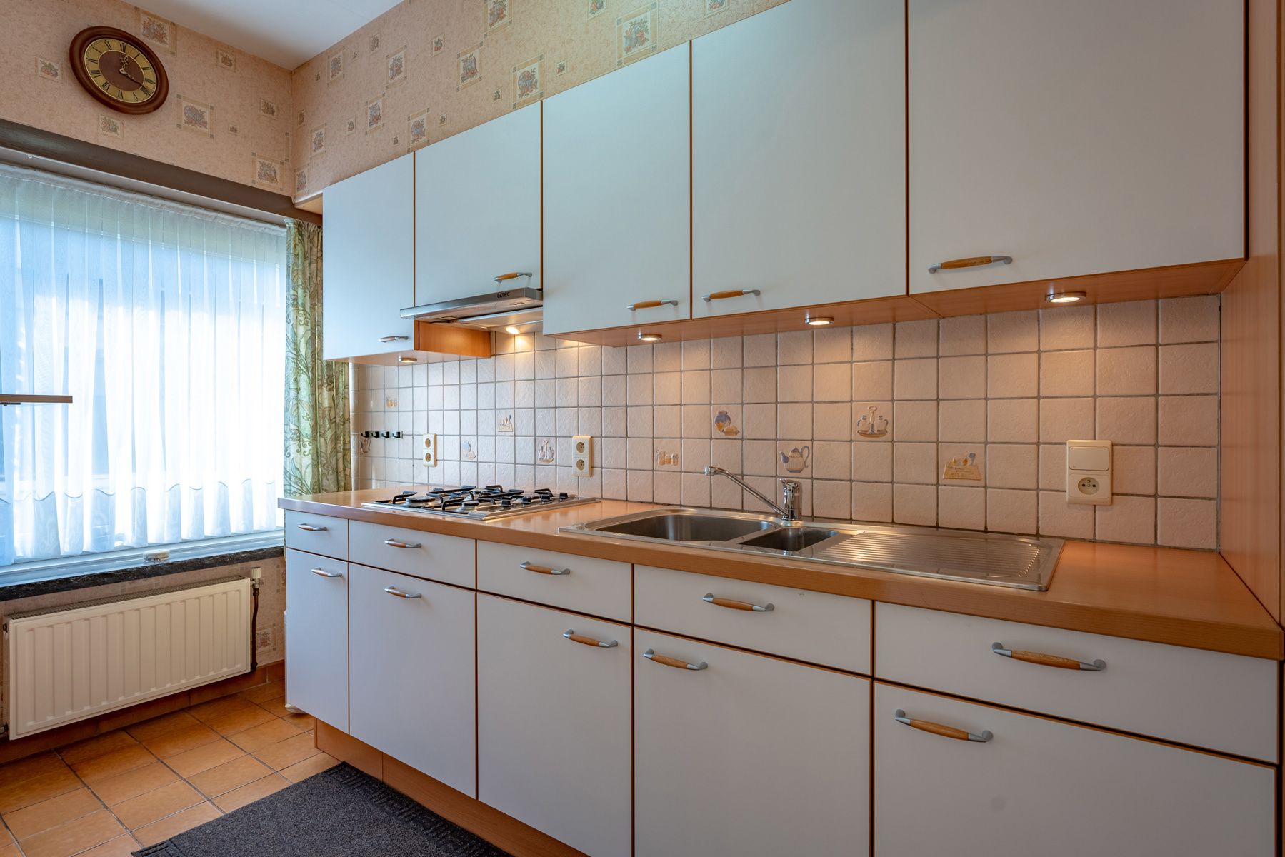 Verzorgd appartement op de gelijkvloerse verdieping met garagebox! foto 6